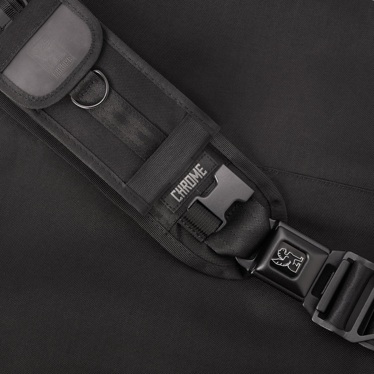 Large Phone Pouch in black attached to a Messenger bag strap