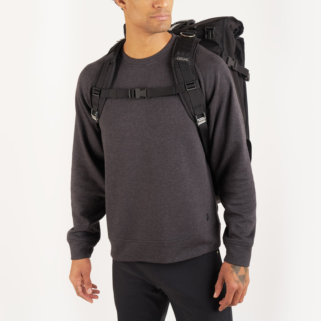 Black Barrage Pro backpack on a man front detail 